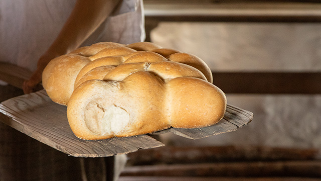 Fresh loaves of bread from the wood-fired oven at King’s Bakery in the Fortress of Louisbourg
